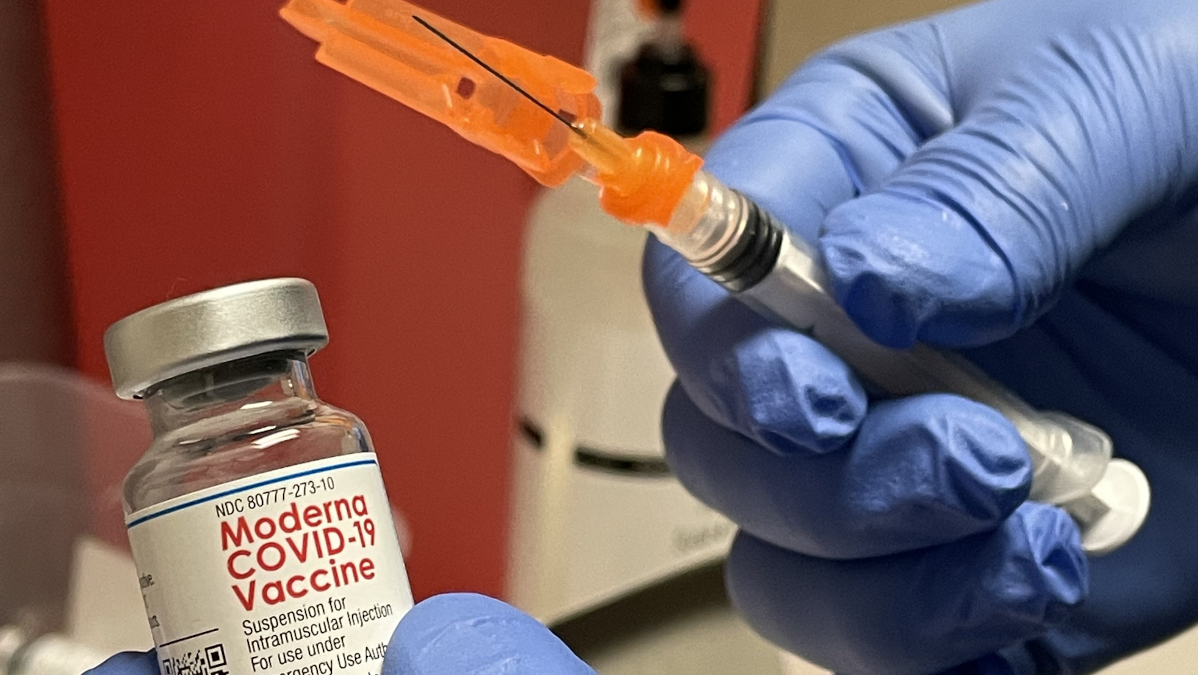 A Moderna vaccine and needle from RMI's COVID vaccine project.